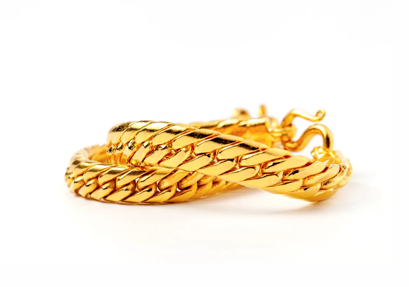 A heavy gold curb-link bracelet