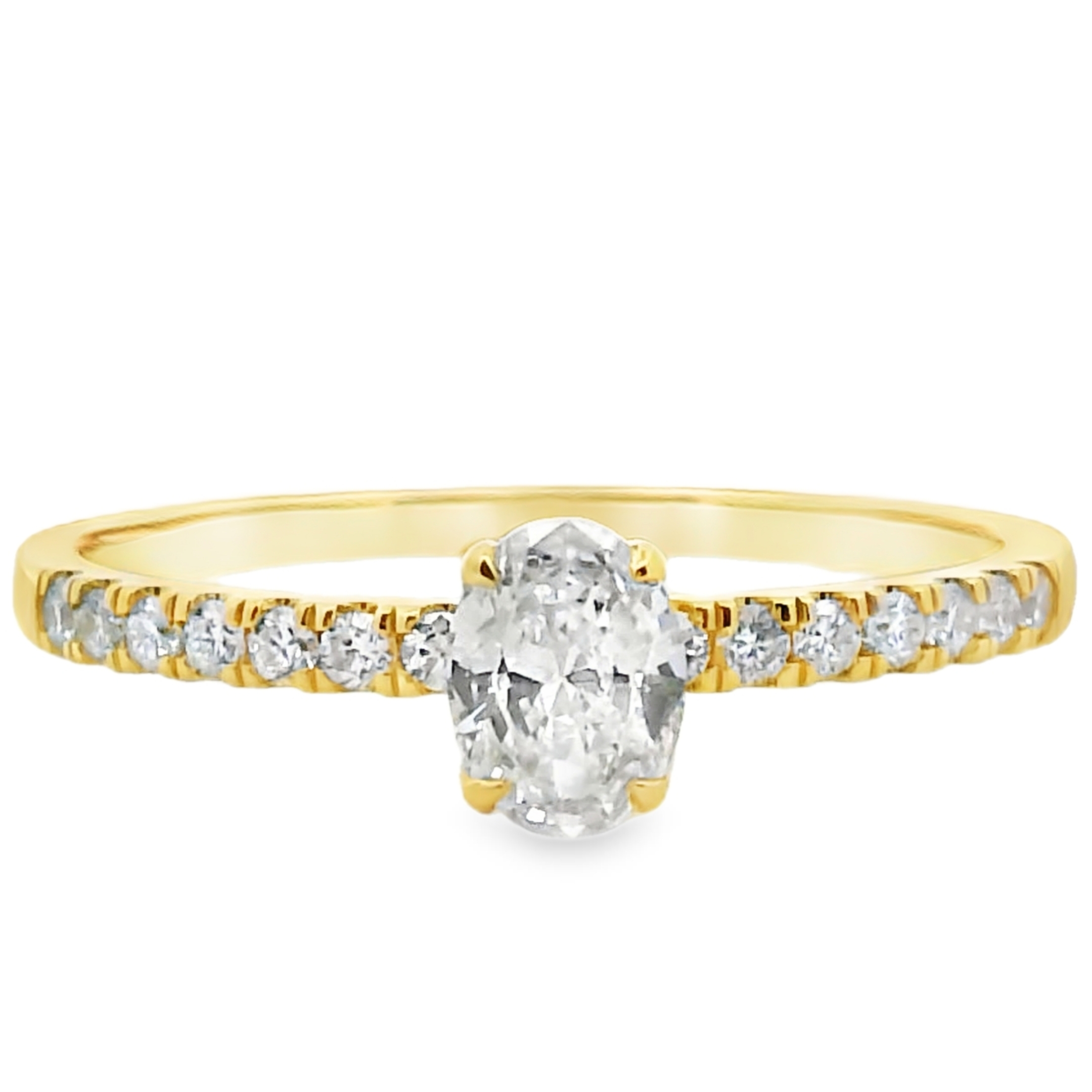 An oval brilliant diamond solitaire on a slender yellow gold band